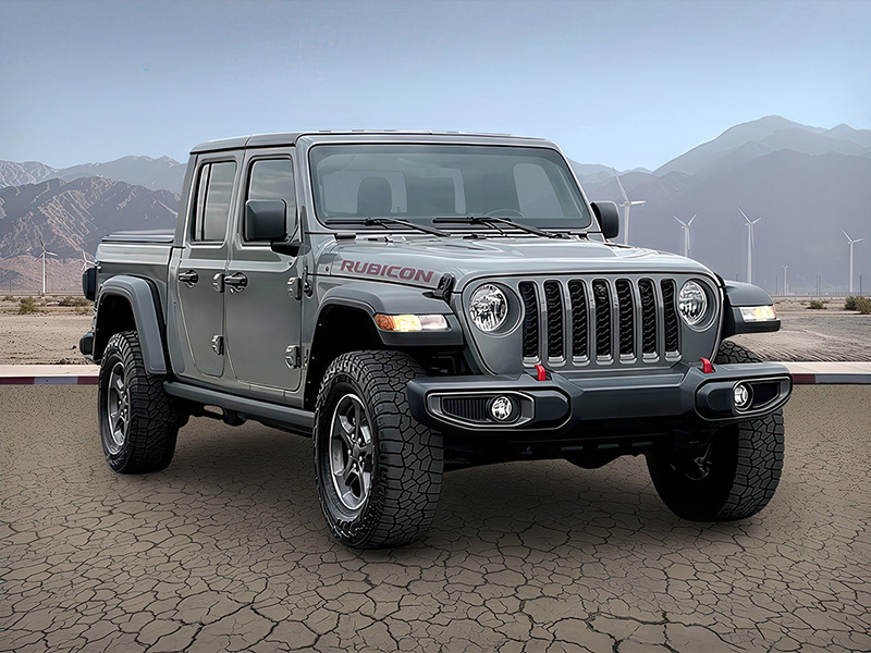 La misma camioneta Jeep presentada con un paisaje de montañas de fondo.